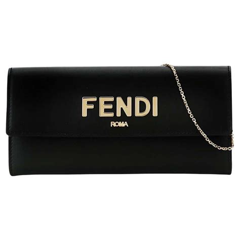 gold fendi clutch